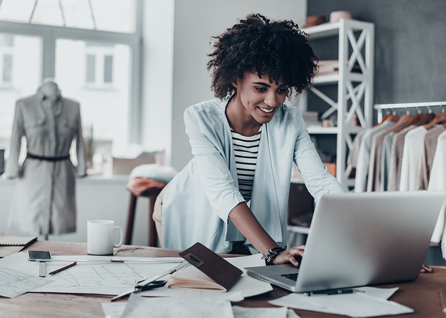 image of woman typing on computer