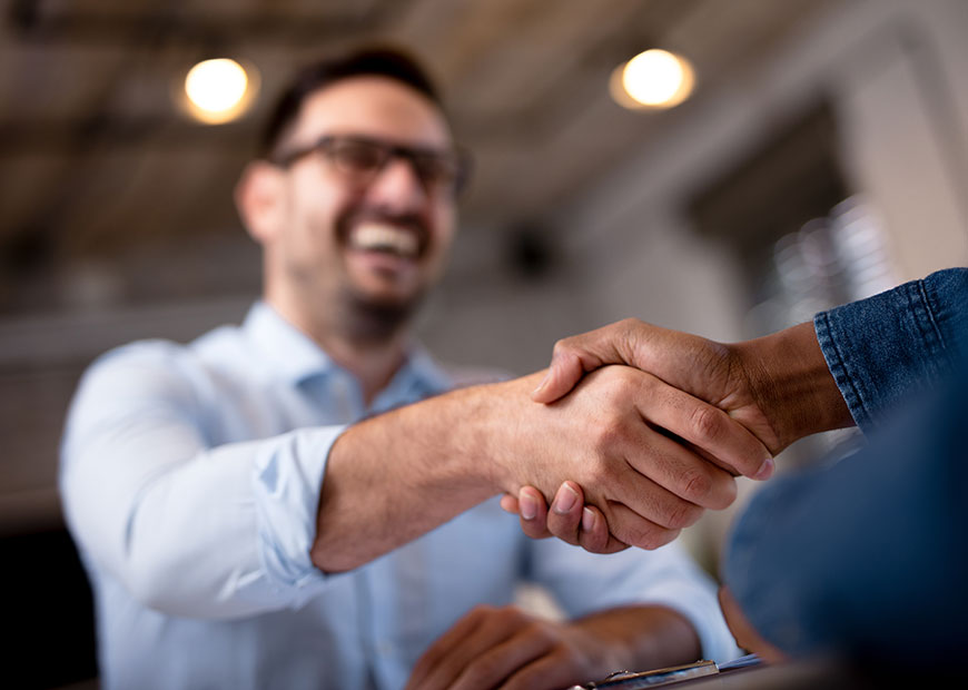 image of man shaking hands