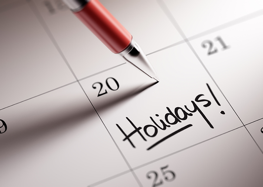 image of calendar with Holidays written on a date