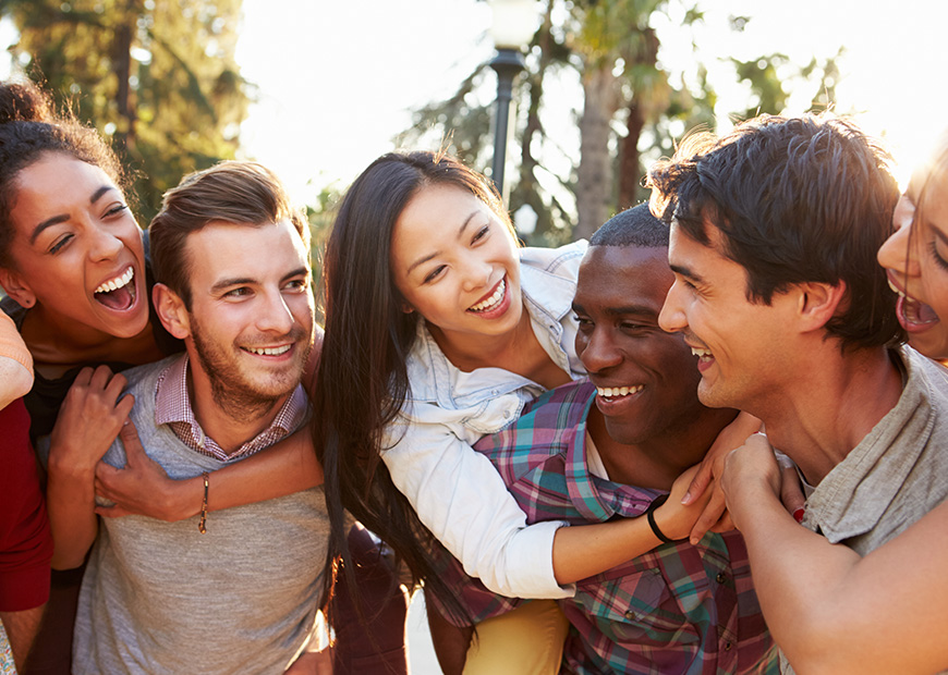 image of group of diverse friends hugging