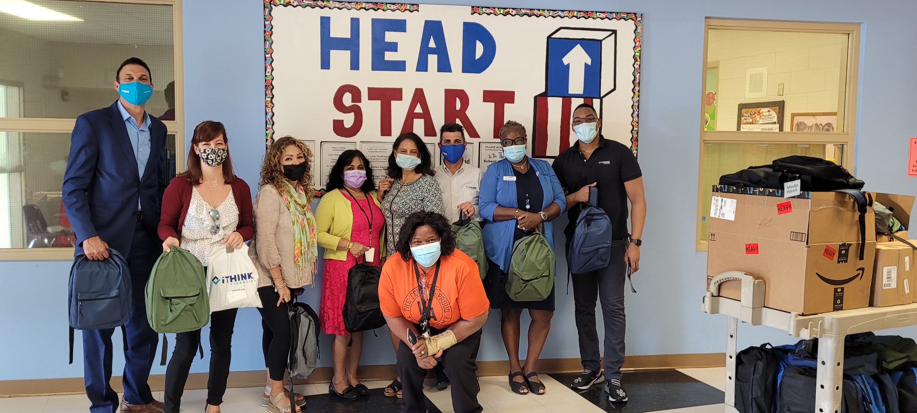 SRD_2021_3 image of School Ready Day event with employees in front of Head Start background